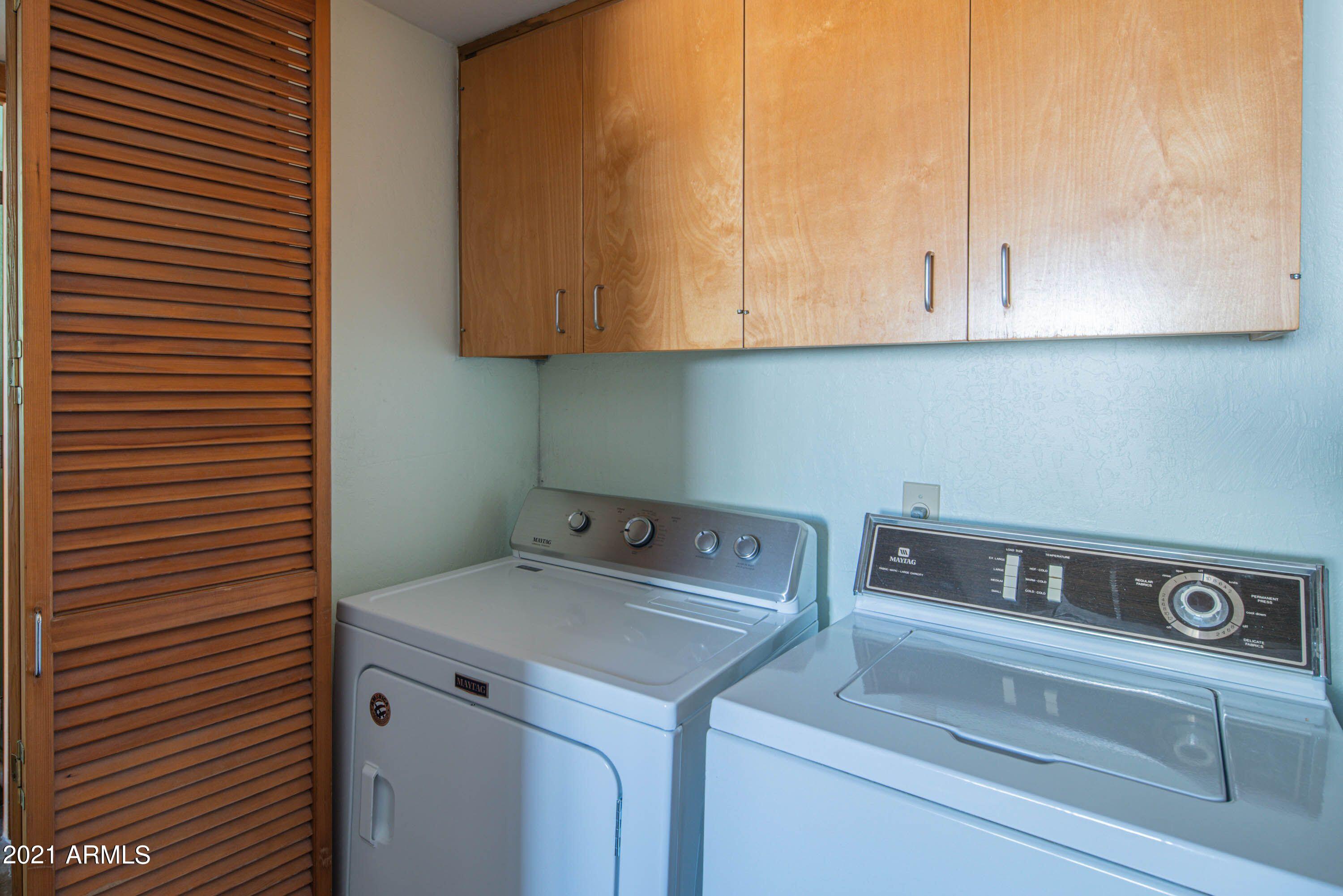 1250 East Bethany Home Road, Unit 6 Phoenix, AZ 85014 - Photo 11 of 20 Inside Laundry Room with upper cabinets
