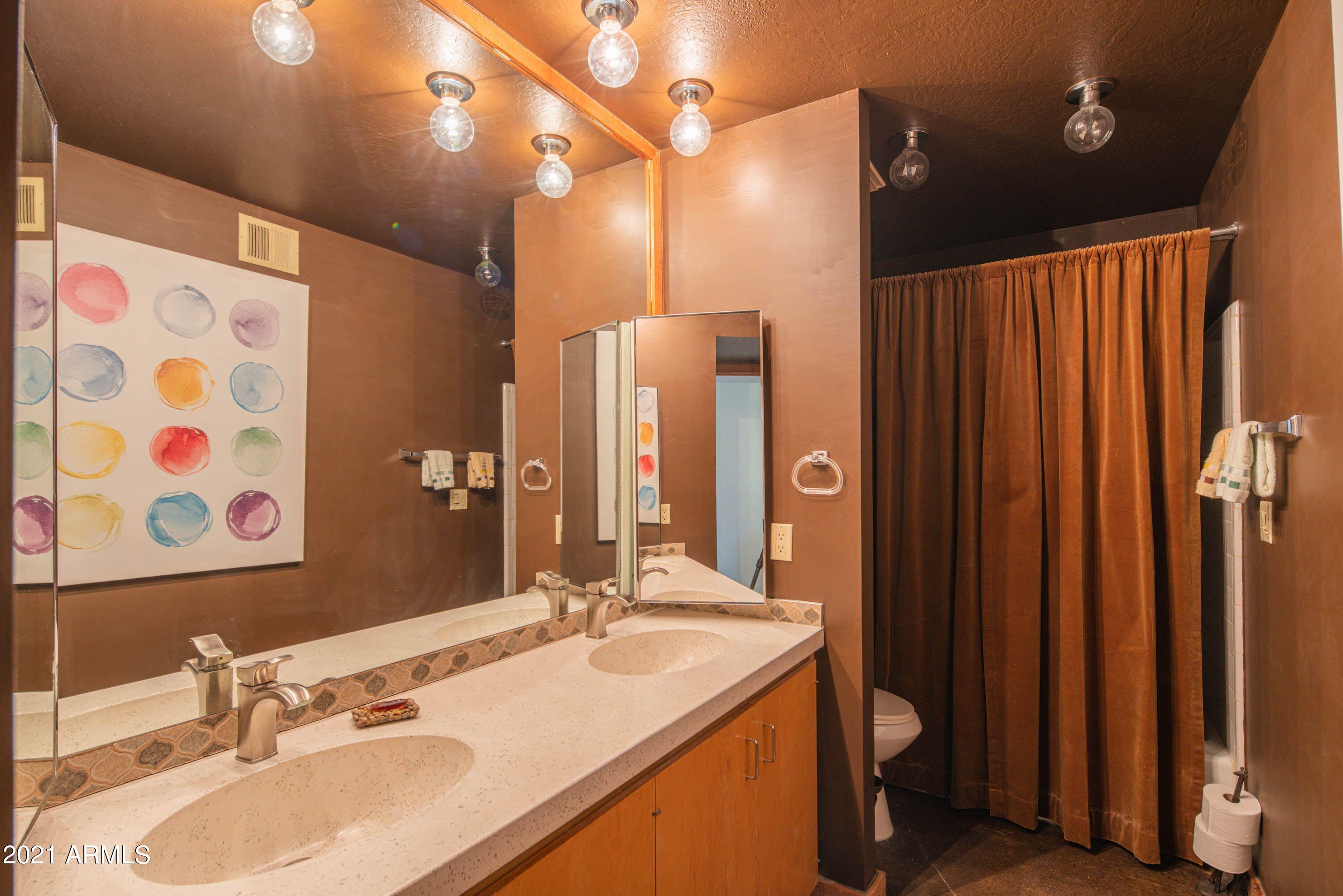 1250 East Bethany Home Road, Unit 6 Phoenix, AZ 85014 - Photo 14 of 20 Hall Bath with Custom Counters