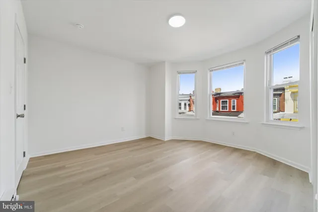 an empty room with windows