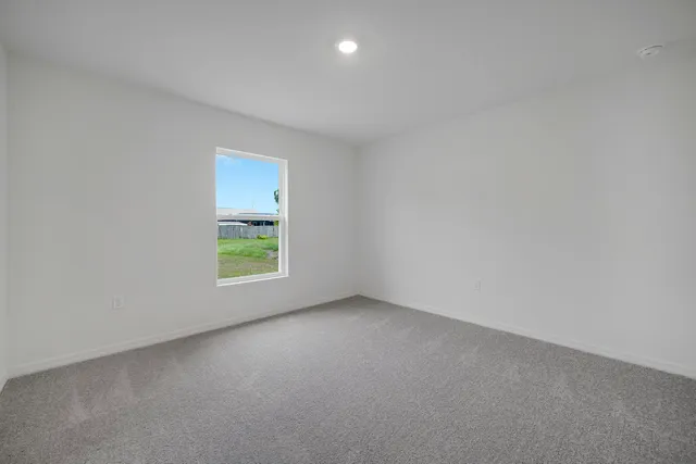 a view of a window in an empty room