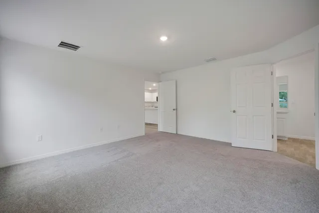 a bathroom with a granite countertop sink mirror and double