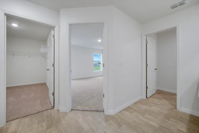 an empty room with windows