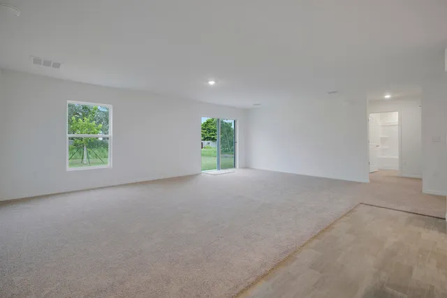 a kitchen with stainless steel appliances a stove sink microwave and cabinets