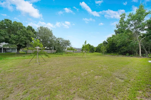 a view of a golf course with a garden