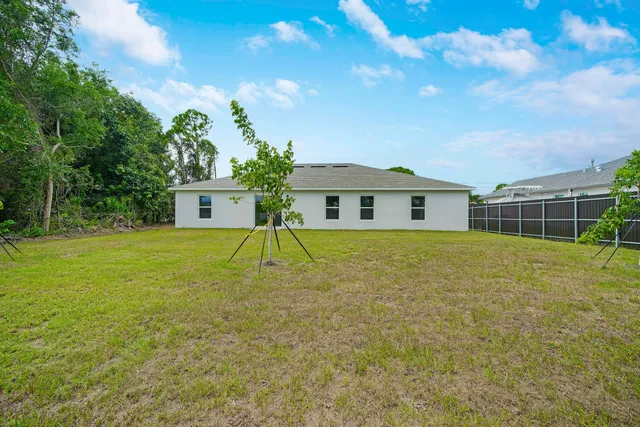 a house view with a garden space