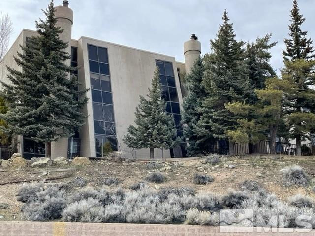 147 Vista Rafael Parkway Reno, NV 89503 - Photo 1 of 15 a view of a house with a yard