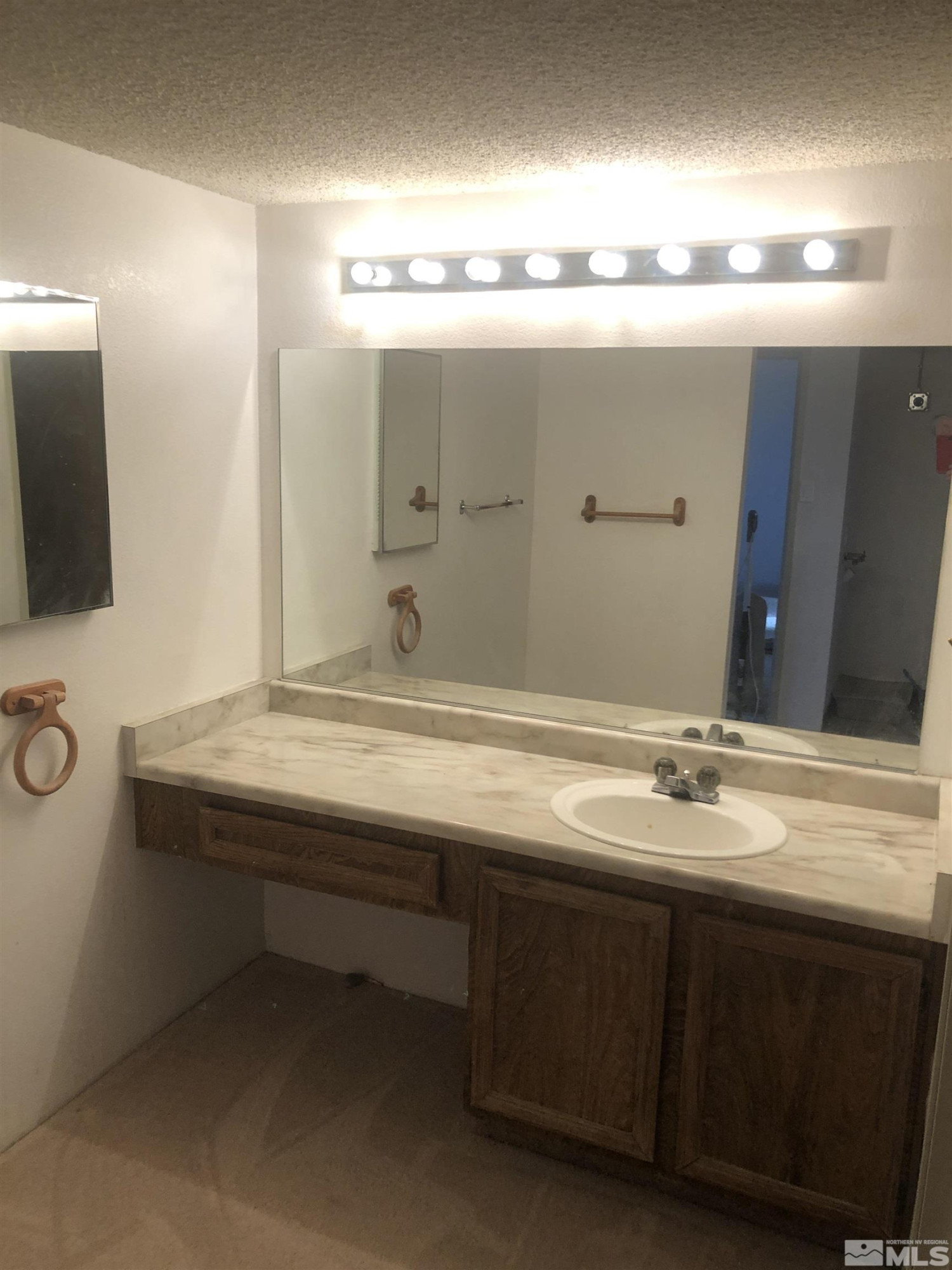 147 Vista Rafael Parkway Reno, NV 89503 - Photo 12 of 15 a bathroom with a sink and mirror