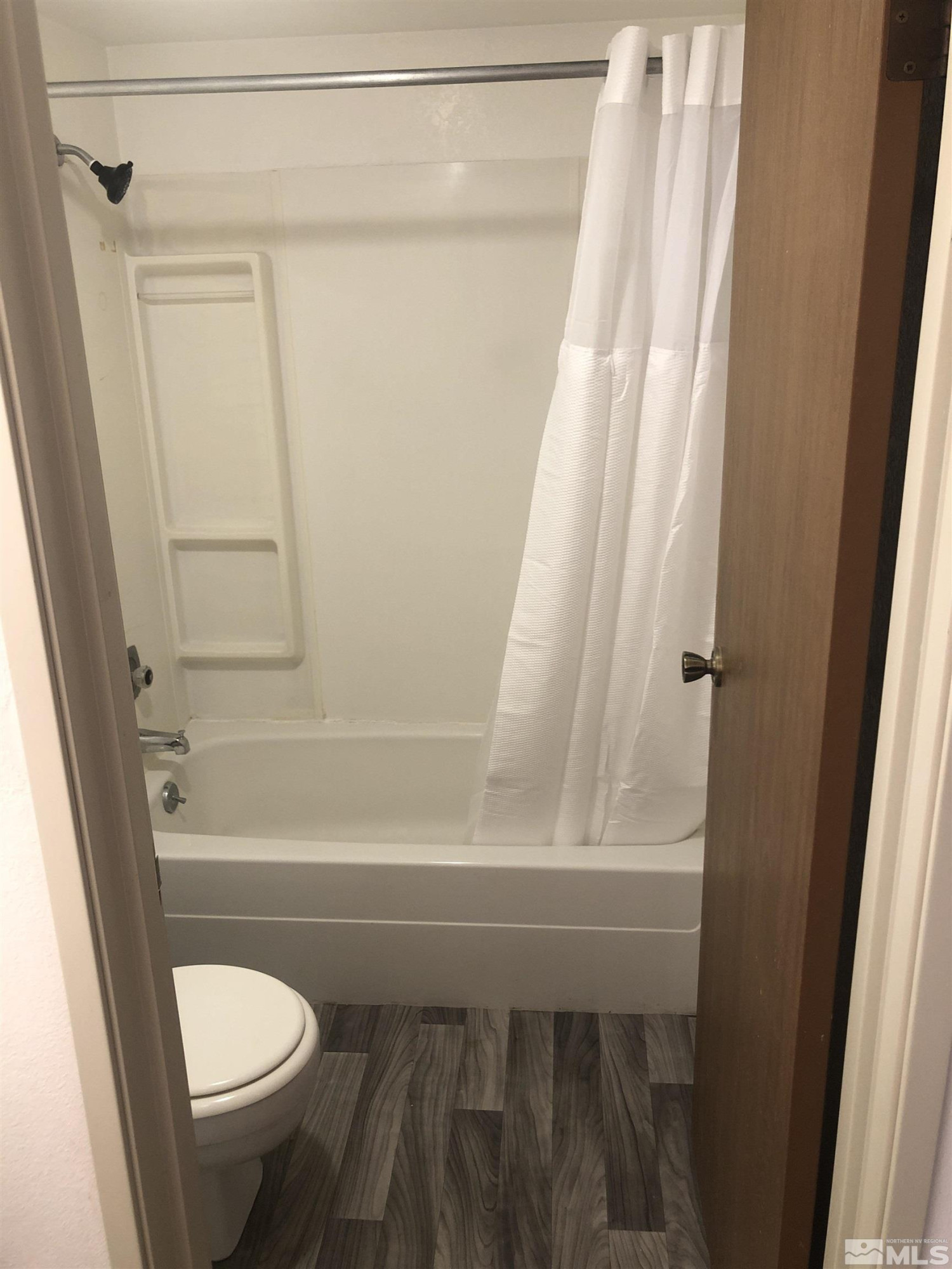 147 Vista Rafael Parkway Reno, NV 89503 - Photo 13 of 15 a bathroom with a toilet and a shower