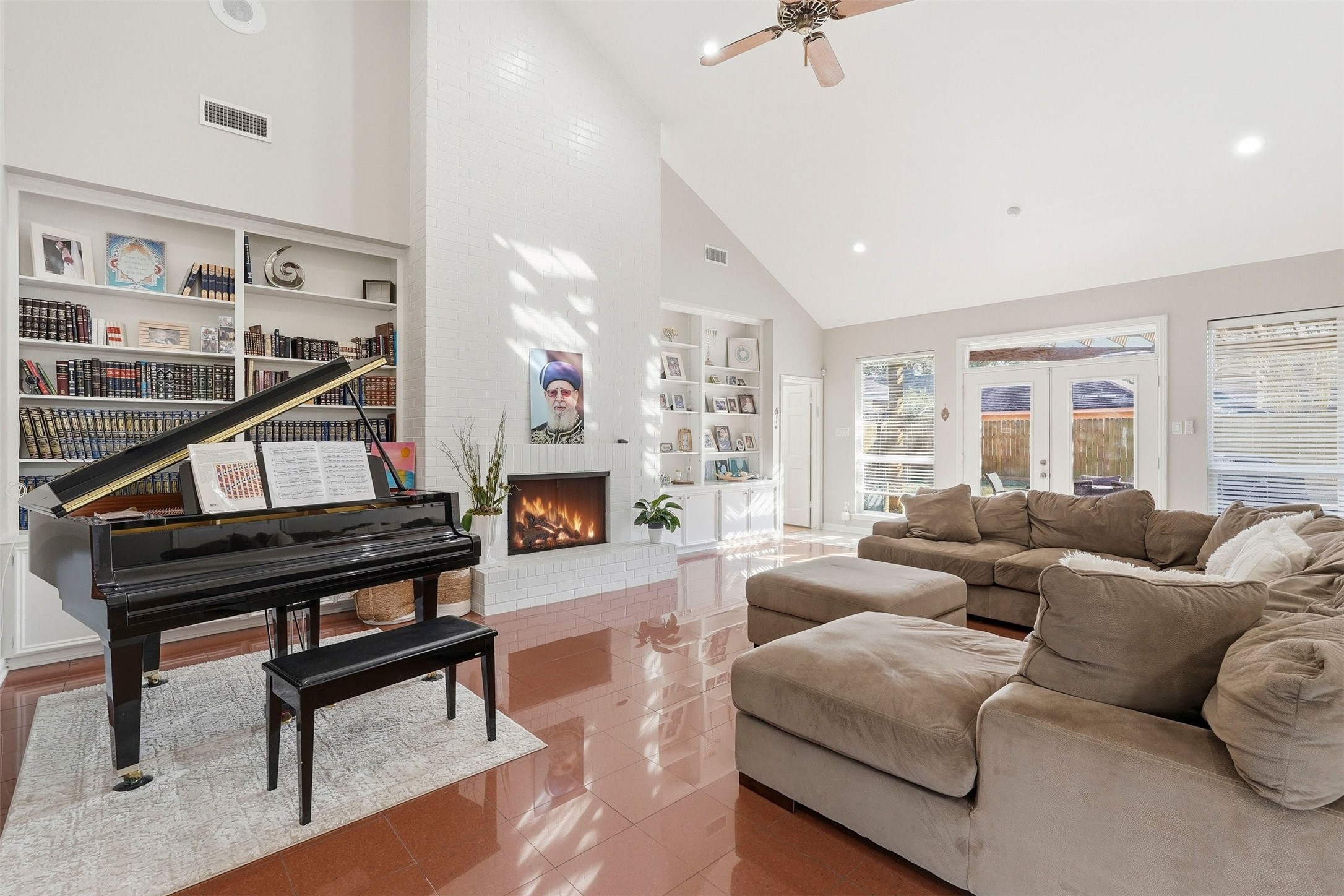 7927 Wolfield Lane Houston, TX 77071 - Photo 4 of 24 a living room with furniture a fireplace and a window