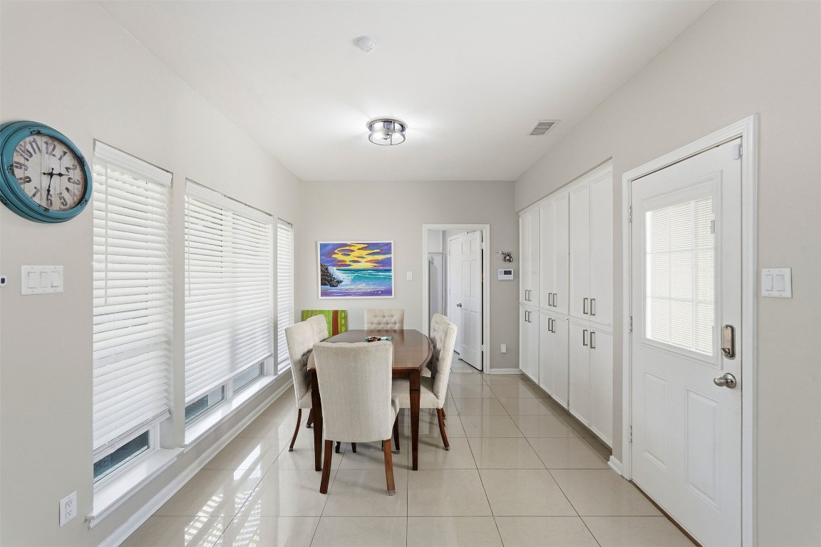 7927 Wolfield Lane Houston, TX 77071 - Photo 6 of 24 a view of a dining room with furniture and a window
