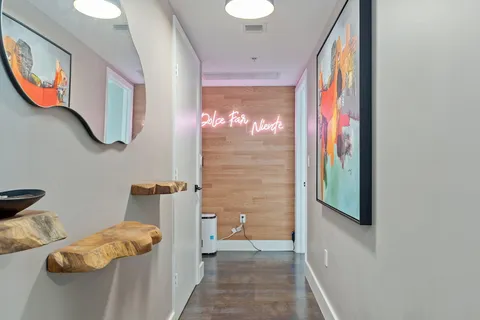 a bathroom with a bathtub and shower