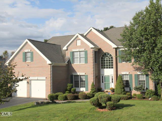 68 Salem Road Trumbull, CT 06611 - Photo 1 of 1 a view of a house with a big yard and potted plants