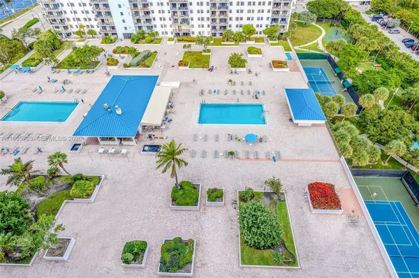 an aerial view of house with yard