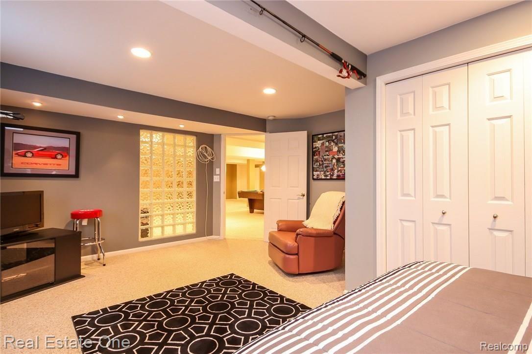 3550 Johnson Road Saline, MI 48176 - Photo 35 of 82 SPACIOUS BR W/GLASS BLOCK WALL
