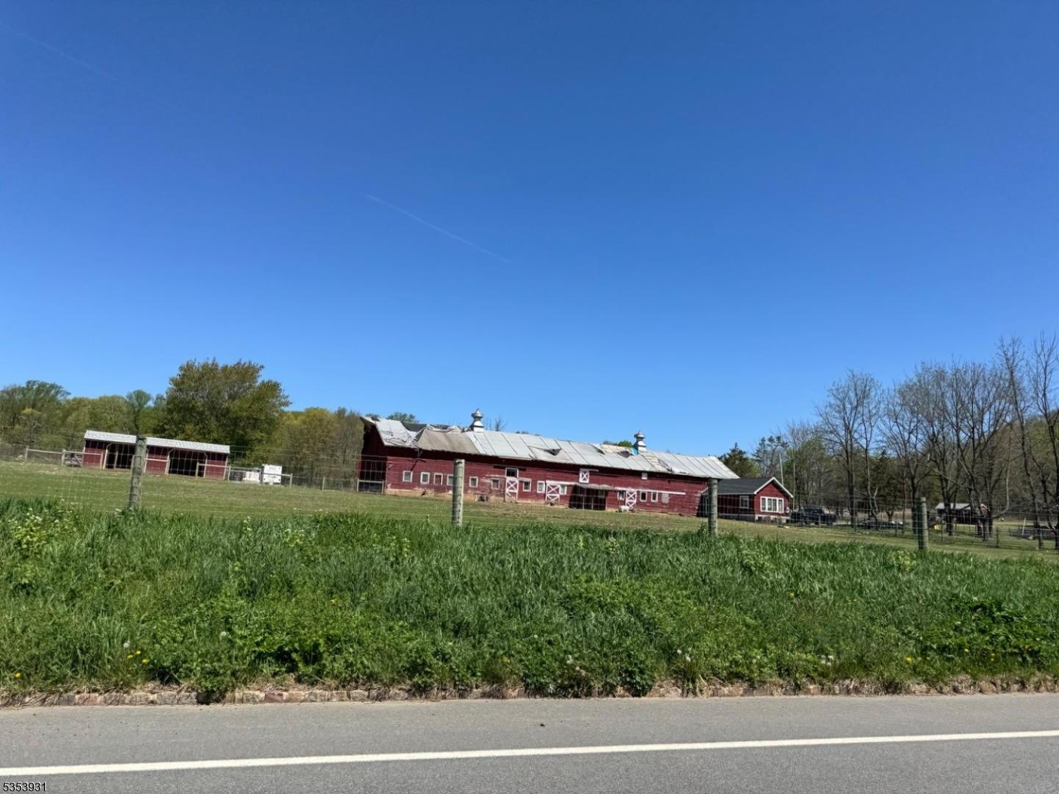 95 A Calais Road Randolph, NJ 07869 - Photo 2 of 4 a view of a house with a yard and sitting area