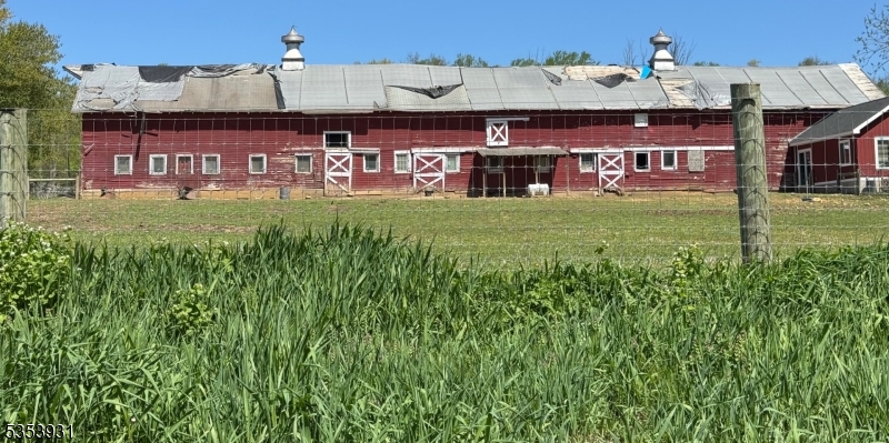 95 A Calais Road Randolph, NJ 07869 - Photo 3 of 4 an outdoor area with trees in the background