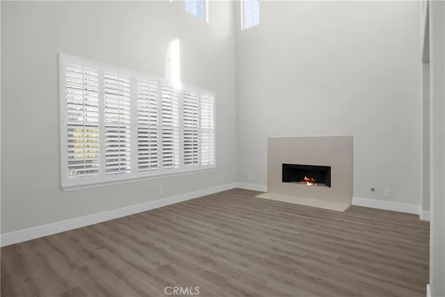 a bathroom with a double vanity sink mirror and bathtub