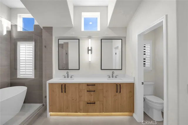 a white bath tub sitting in a bathroom