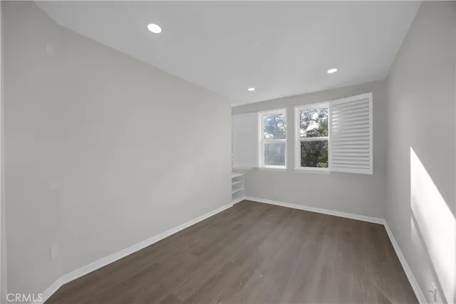 a view of a house with backyard porch and sitting area