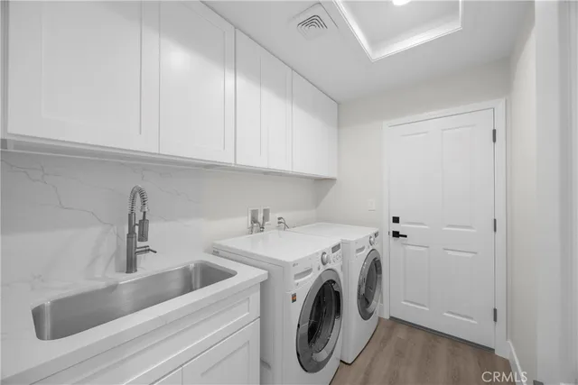 a white stove top oven sitting next to a white house