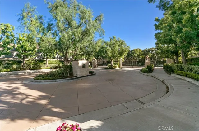 a view of a street with houses on both side