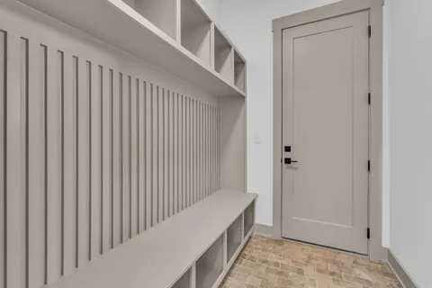 a view of a house with a yard and a garage