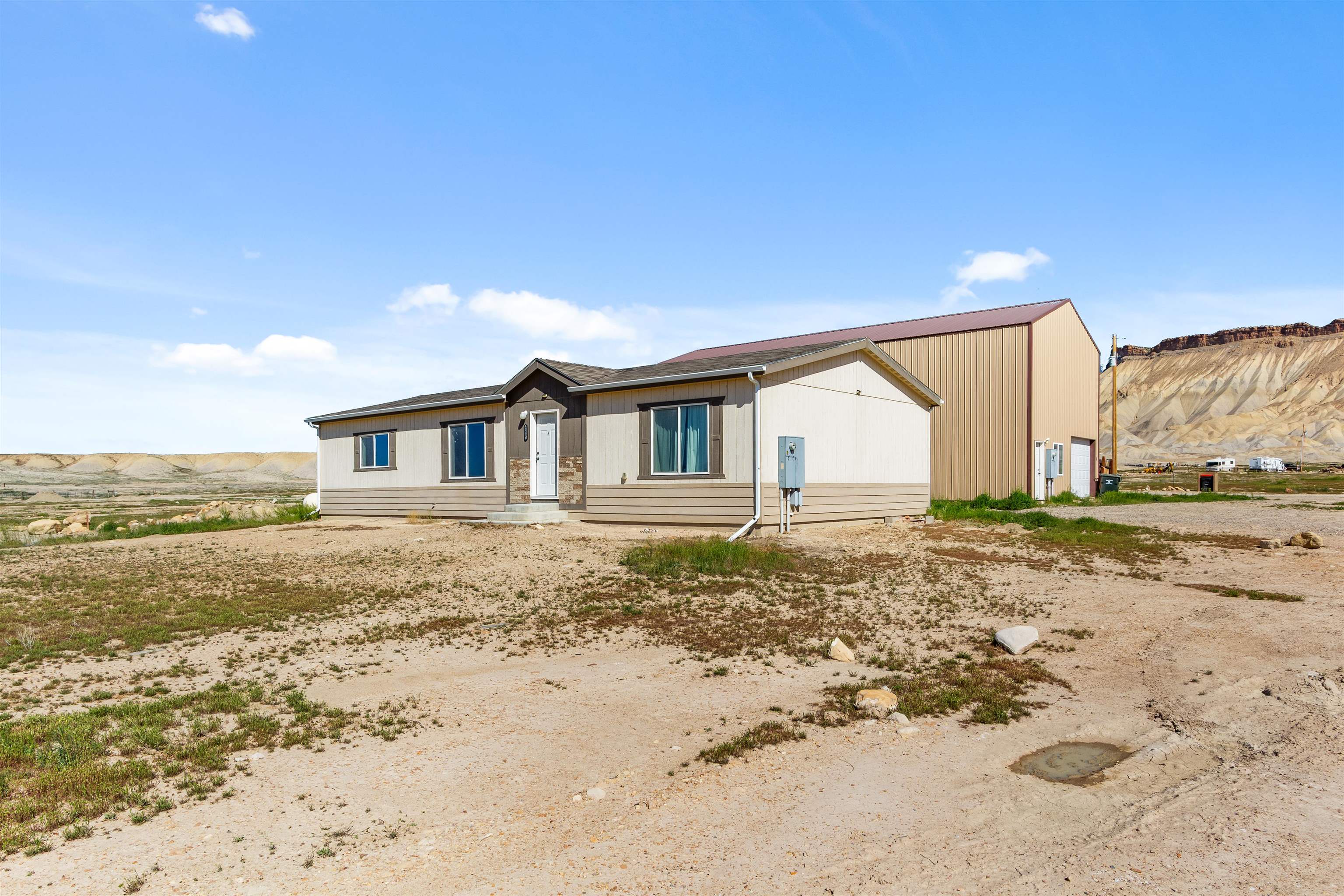 759 33 Road Clifton, CO 81520 - Photo 31 of 35 a view of a house with a ocean beach