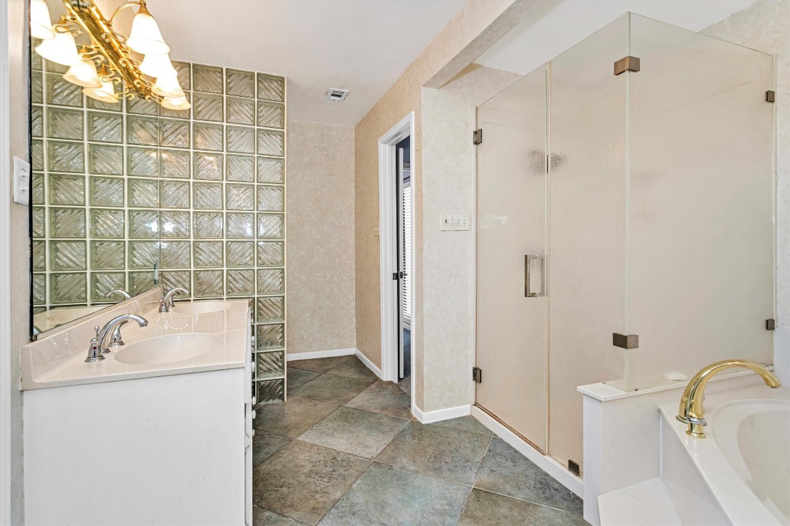 50 April Point Drive South Conroe, TX 77356 - Photo 26 of 30 a bathroom with a sink toilet and shower