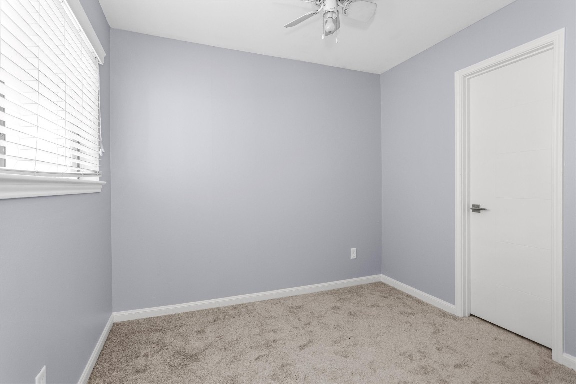 50 April Point Drive South Conroe, TX 77356 - Photo 28 of 30 an empty room with a window