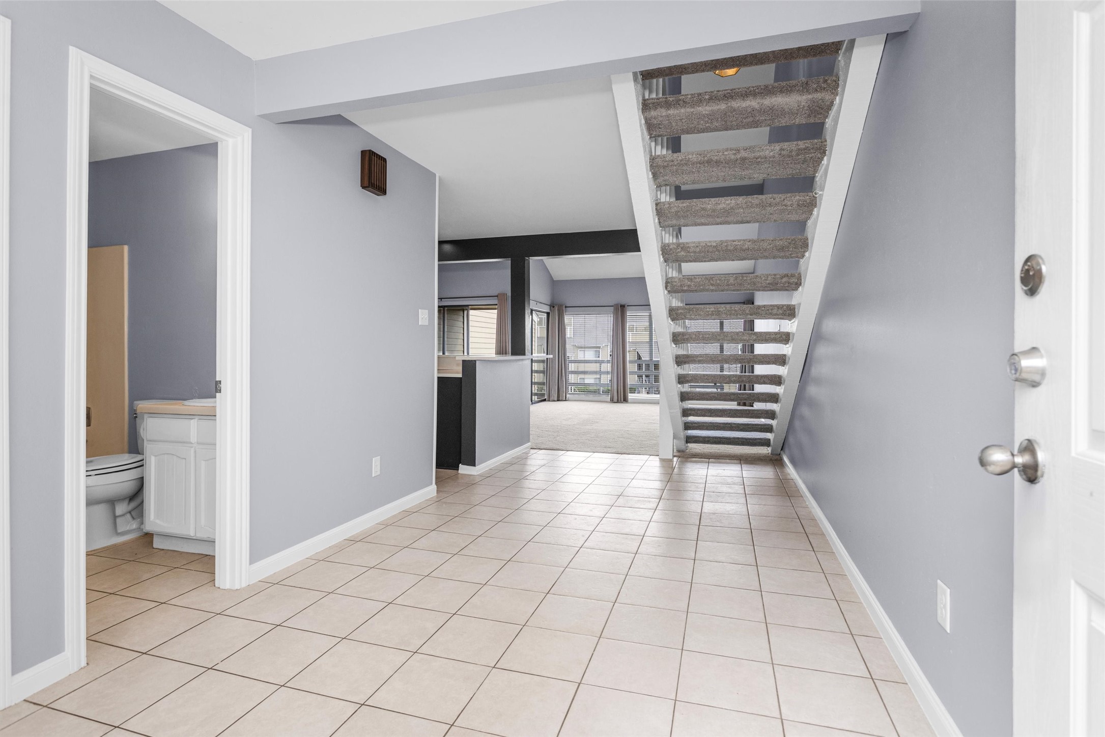 50 April Point Drive South Conroe, TX 77356 - Photo 4 of 30 View from front door: bedroom and bathroom to the left