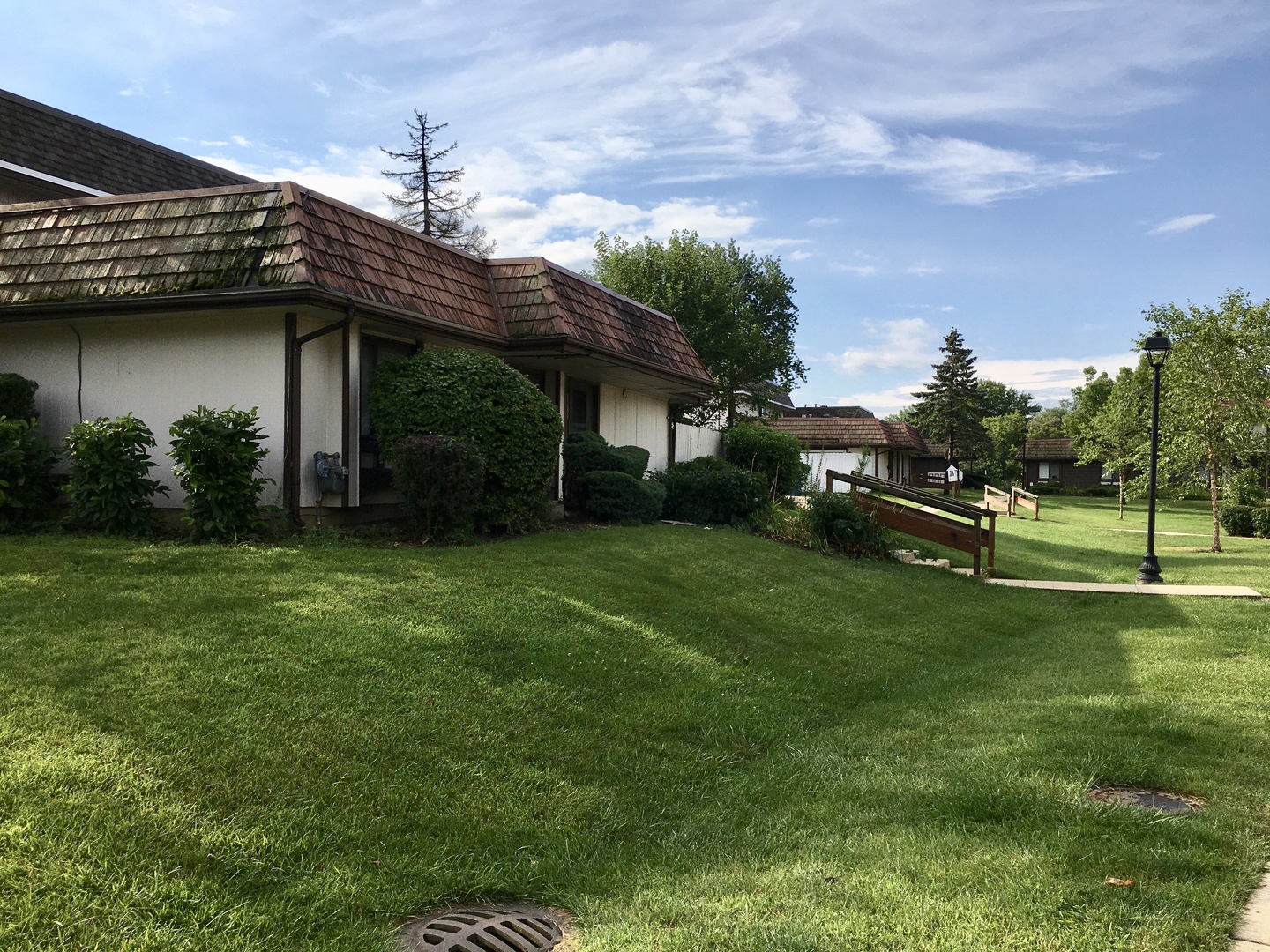 Undisclosed Address Hanover Park, IL 60133 - Photo 2 of 10 a view of a house with a yard