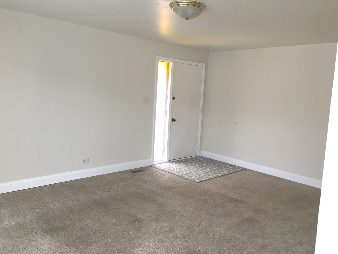 Undisclosed Address Hanover Park, IL 60133 - Photo 3 of 10 an empty room with a window