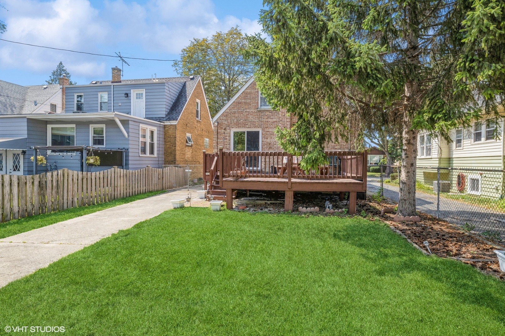 4123 Maple Avenue Brookfield, IL 60513 - Photo 16 of 18 a view of a house with a yard and sitting area