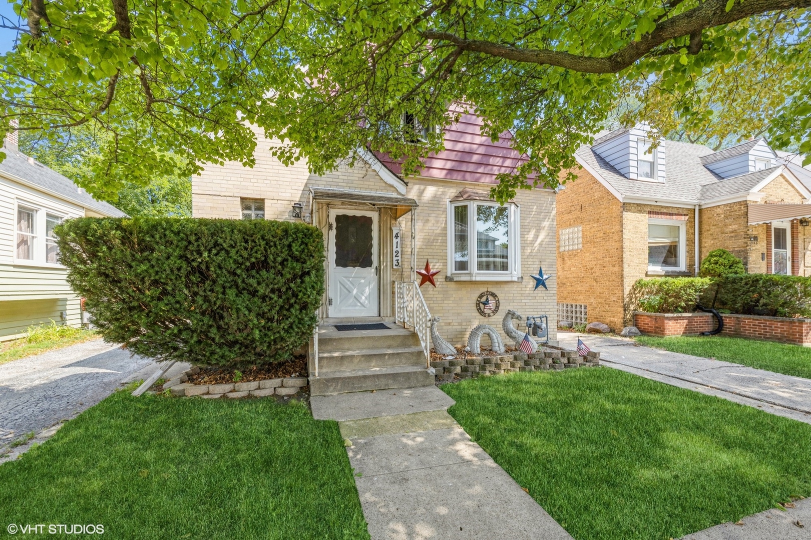 4123 Maple Avenue Brookfield, IL 60513 - Photo 2 of 18 a front view of house with yard and green space