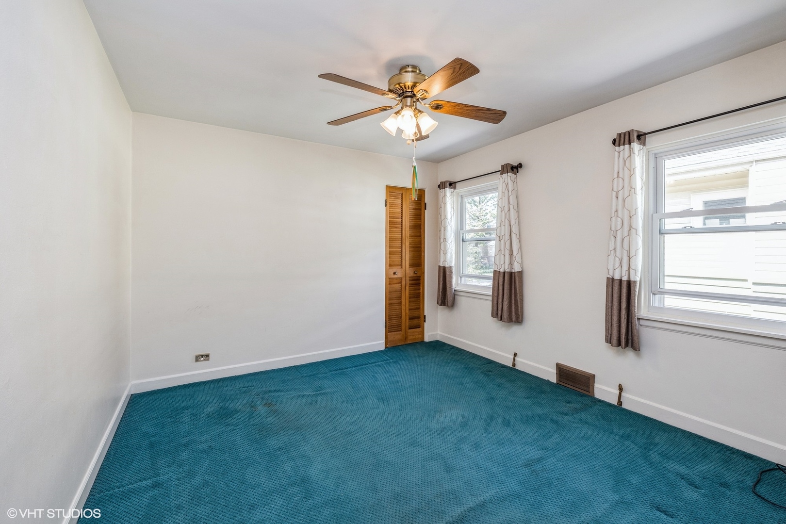 4123 Maple Avenue Brookfield, IL 60513 - Photo 10 of 18 wooden floor in an empty room with a window