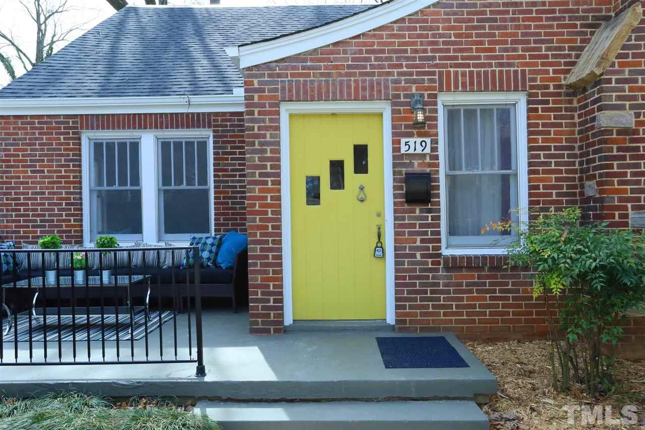 519 Washington Street Raleigh, NC 27605 - Photo 5 of 30 a front view of a house with a garden