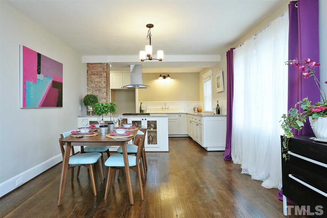 519 Washington Street Raleigh, NC 27605 - Photo 8 of 30 a view of a dining room with furniture and wooden floor