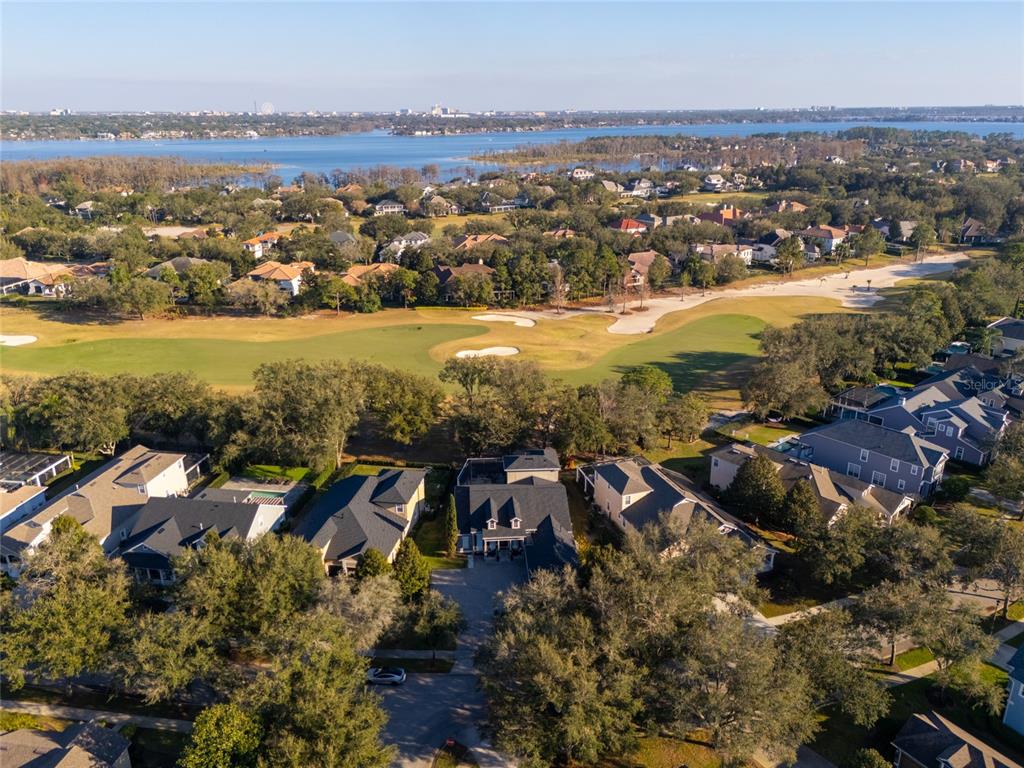 6001 Caymus Loop Windermere, FL 34786 - Photo 38 of 44 an aerial view of residential building and lake