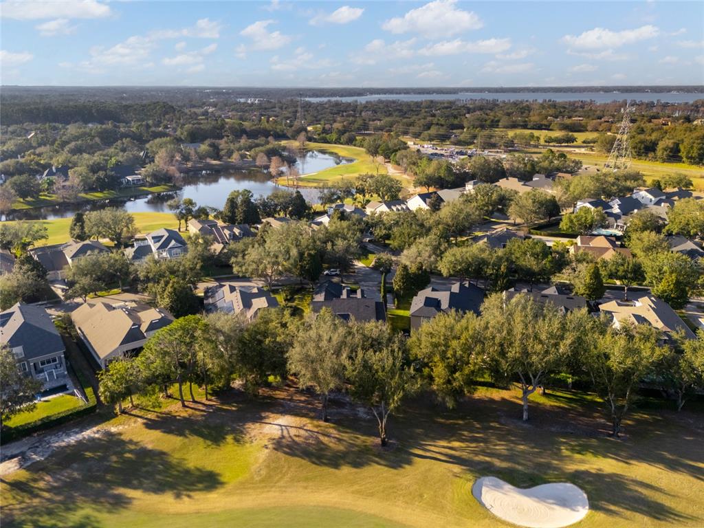 6001 Caymus Loop Windermere, FL 34786 - Photo 39 of 44 an aerial view of residential houses with yard
