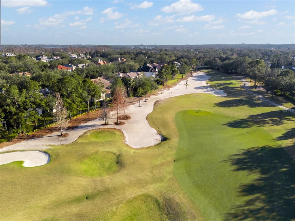 6001 Caymus Loop Windermere, FL 34786 - Photo 40 of 44 a view of a swimming pool with an ocean