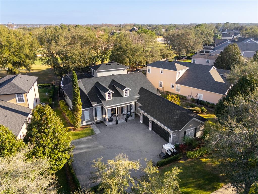 6001 Caymus Loop Windermere, FL 34786 - Photo 4 of 44 an aerial view of a house with a ocean view