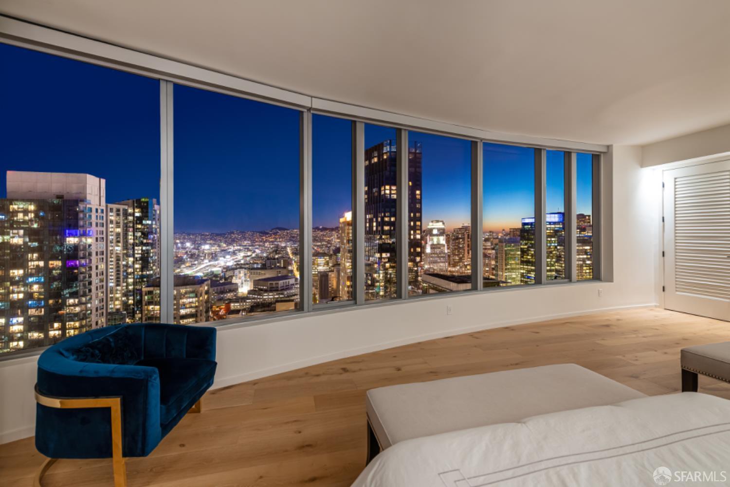 201 Folsom Street, Unit PH41C San Francisco, CA 94105 - Photo 22 of 72 a living room with couches and painted walls