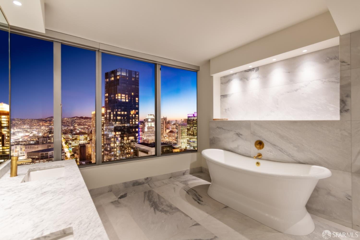 201 Folsom Street, Unit PH41C San Francisco, CA 94105 - Photo 26 of 72 a bathroom with a bathtub and a sink