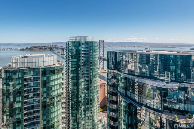 a view of a city with tall buildings