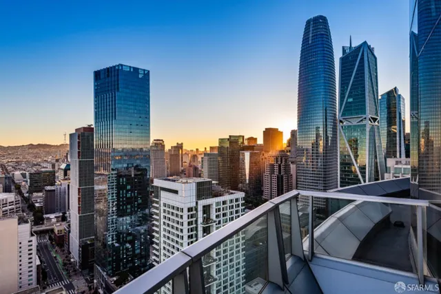 a view of swimming pool with a balcony
