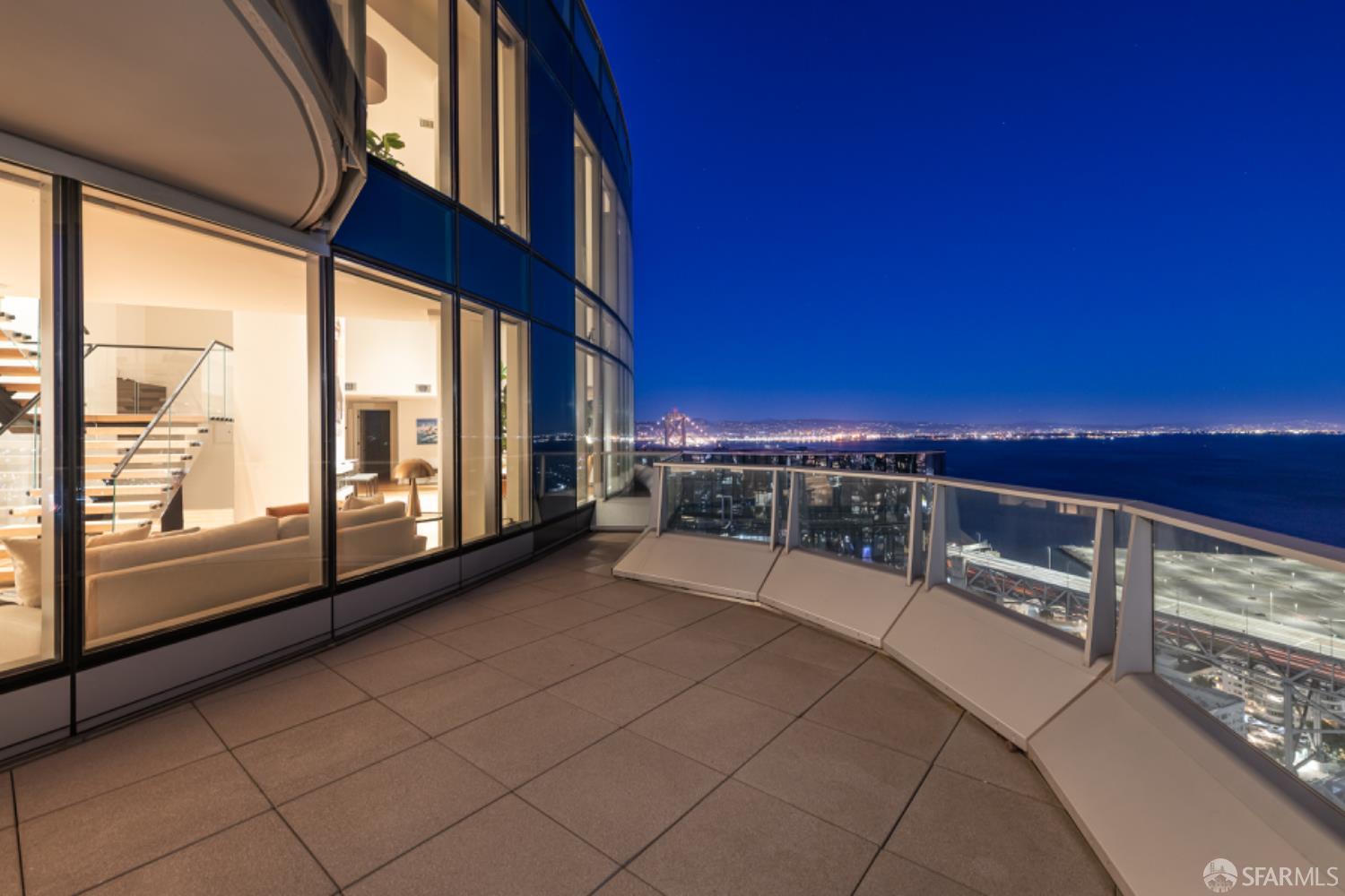 201 Folsom Street, Unit PH41C San Francisco, CA 94105 - Photo 50 of 72 a view of balcony with two chairs and a swing