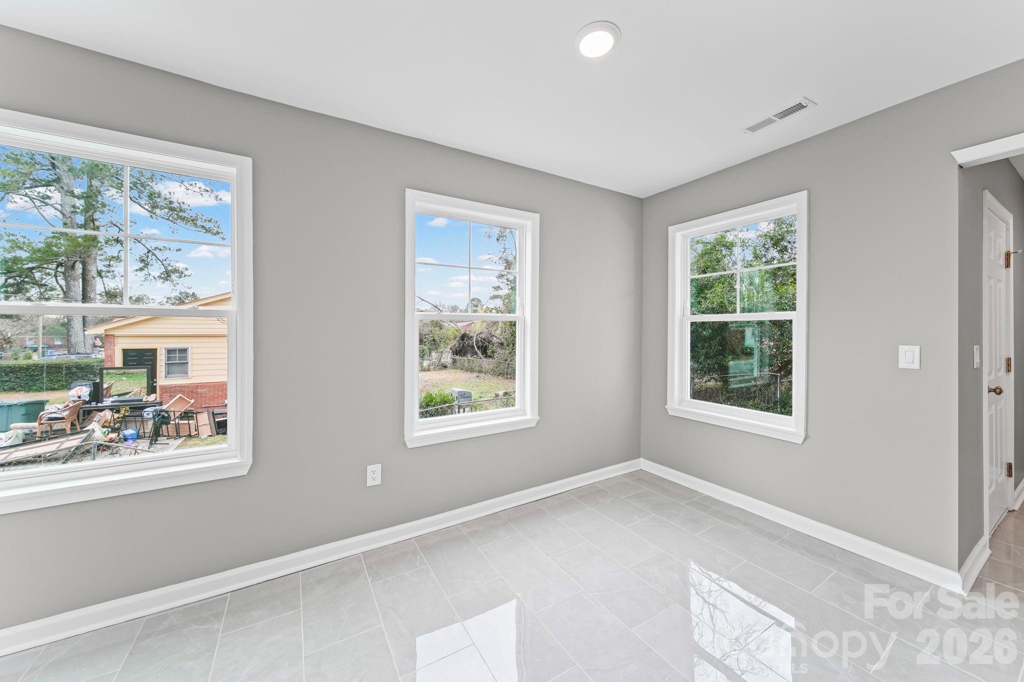 4913 Jones Street, Unit 12 Columbia, SC 29203 - Photo 6 of 17 a view of an empty room with a window