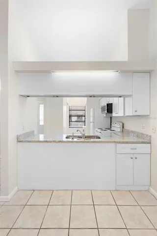 $199,900 | 245 Terrace Hill Boulevard, Unit 1E, DeBary, FL 32713