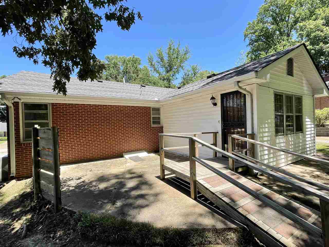 256 Thompson Drive Ripley, TN 38063 - Photo 3 of 17 a backyard of a house with seating space