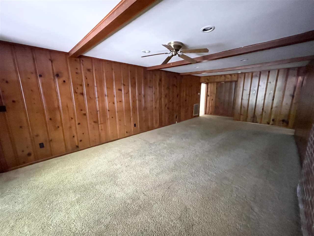 256 Thompson Drive Ripley, TN 38063 - Photo 6 of 17 a view of a room with a ceiling fan and window